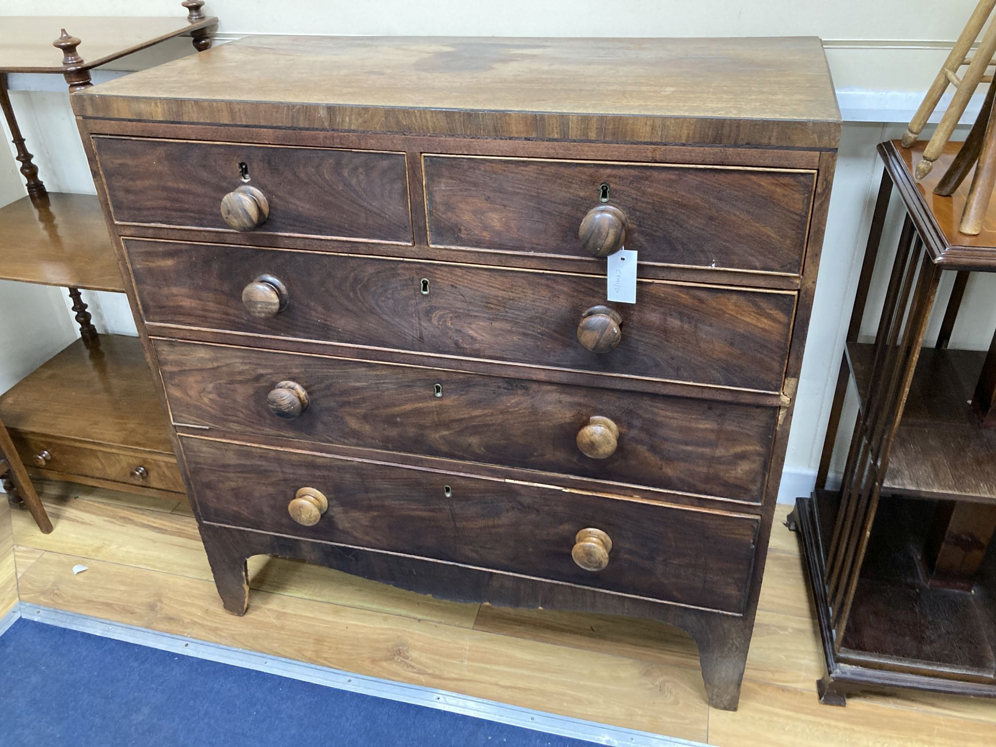 A Regency mahogany straight front chest of drawers, with turned knob handles, width 97cm, depth 46cm, height 99cm